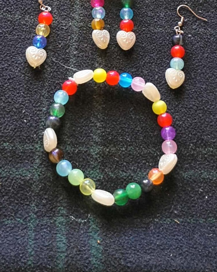 A bracelet of multicolored beads and white hearts from Ronald's just for fun set